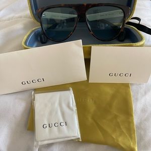 Gucci sunglasses (mens or women’s)